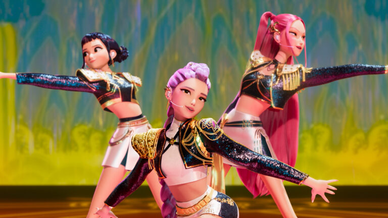 L-R: Zoey, Rumi (front) and Mira pose on-stage in a scene from Netflix's &quot;KPop Demon Hunters&quot;
