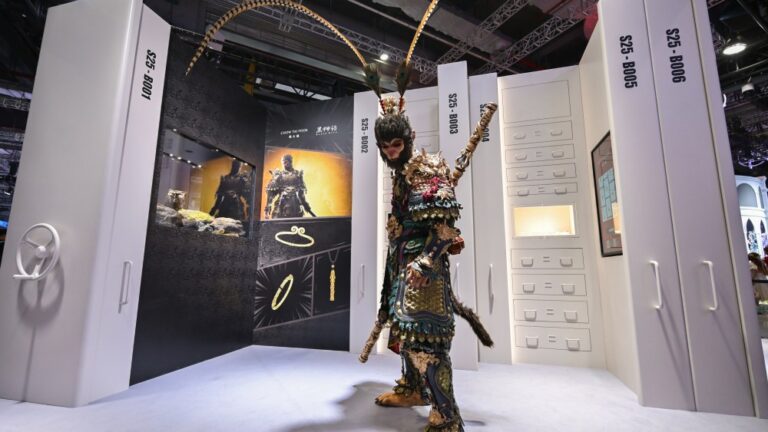 A Black Wukong cosplay performer at Chow Tai Fook's Bilibili World booth.