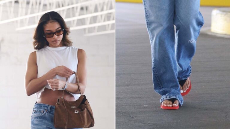 Lori Harvey wearing The Row's Dune flip-flops in Scarlett and carrying the Balenciaga Rodeo bag while out in Los Angeles over the weekend.