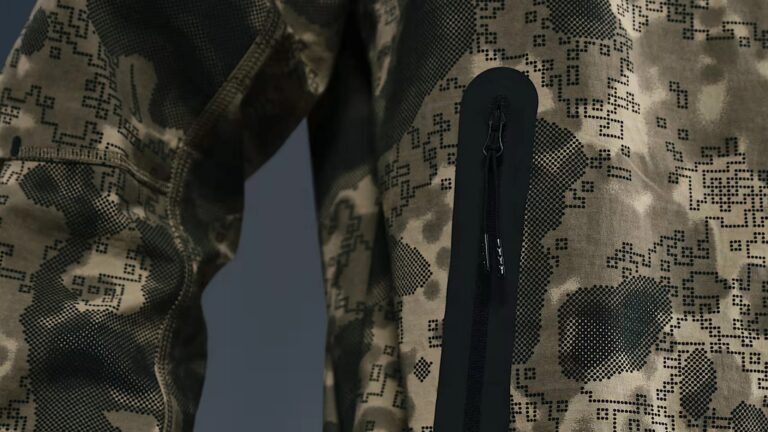A close-up of Nike Windrunner Jacket in camo