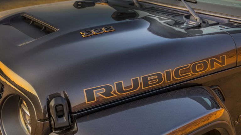 a close-up of a jeep 392 badge