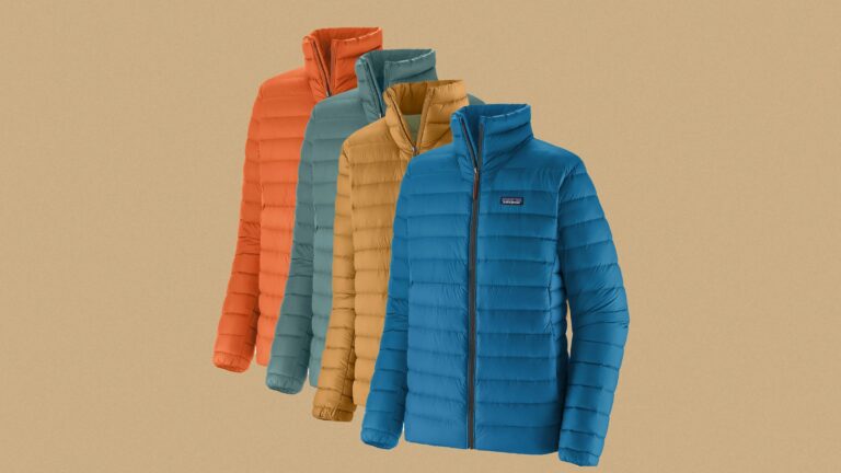 Four insulated Patagonia puffer jackets in different colors—blue, mustard yellow, teal, and orange—are displayed in a staggered arrangement against a beige background. Each jacket features horizontal quilting, a high collar, and a front zipper. The blue jacket in front has a small rectangular logo patch on the left chest.