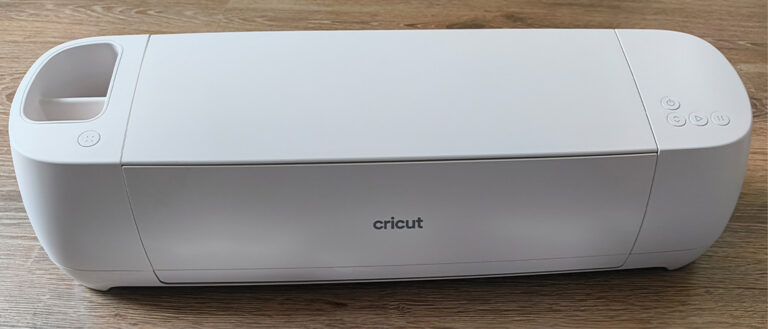 I tested Cricut Explore 4 and found this speedy, whisper-quiet craft machine made my projects easier Cricut Explore 4 review: a white craft machine on a wooden table