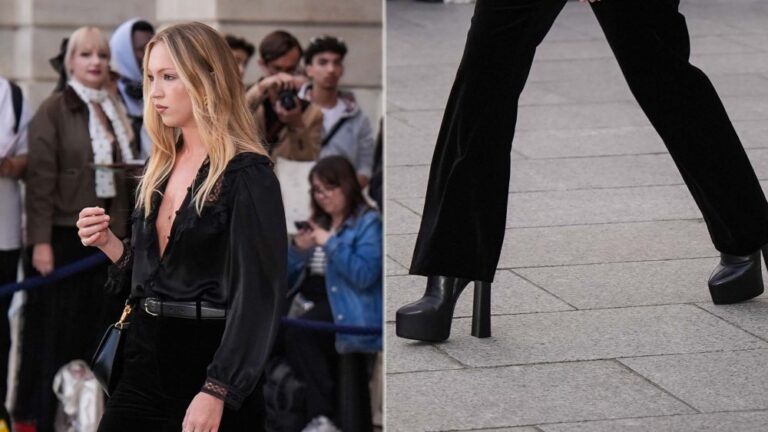 Lila Moss wearing towering platform black boots during Paris Fashion Week on Monday.