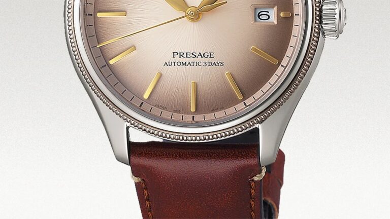Seiko’s Best Affordable Dress Watch Is Even Classier With a Brand-First Strap Design Close-up of a wristwatch with a brown gradient dial featuring gold hour markers and hands, a date window at 3 o