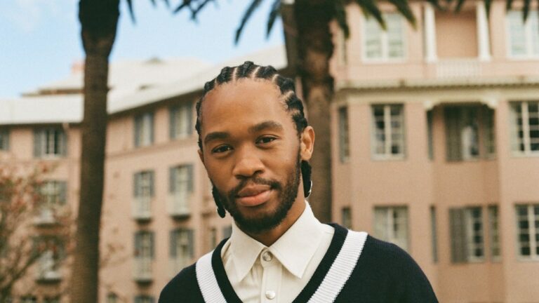 Thebe Magugu on the balcony of the Thebe Magugu Suite at Mount Nelson, A Belmond Hotel