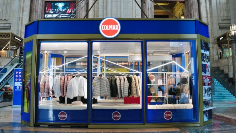 Colmar Opens Pop-Up at Milan Train Station Ahead of Winter Olympics The Colmar cablecar-shaped pop-up at Milan's Central Train Station.