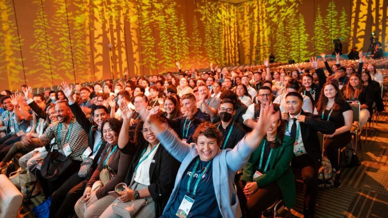 Dreamforce for Marketers — Your 5-Minute Guide A crowd full of people celebrate in a conference hall at the Moscone Center in San Francisco for Dreamforce / Dreamforce for marketers