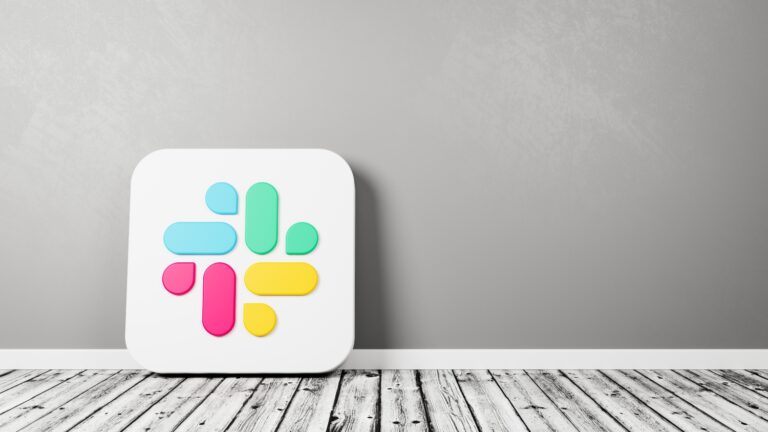 Task Management for SMBs Made Easy With Slack Slack Icon on a wood floor