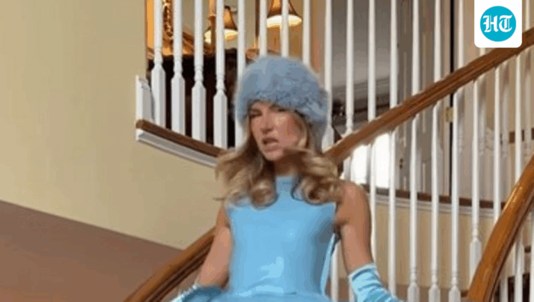 Influencer Brigette Pheloung turns heads in Elsa-like blue inflatable dress for Thanksgiving